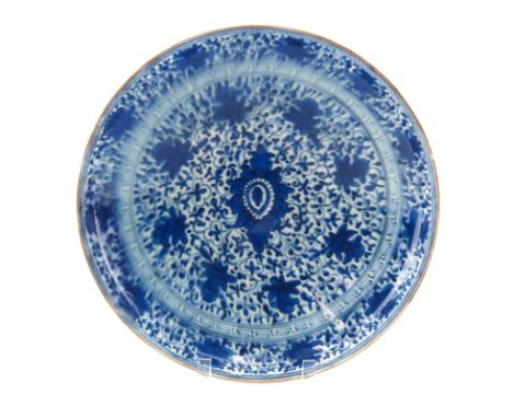 Large 17th Century Persian Blue and White Glazed Ceramic Shallow Bowl. Floral and Greek key style motif on surface, raised ed