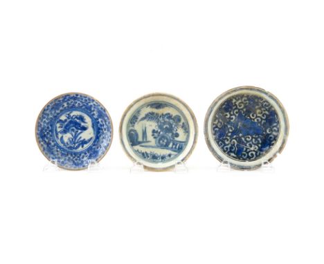 Grouping of Three (3) 17th Century Persian Blue and White Glazed Ceramic Saucers. One saucer is signed. Provenance: acquired 