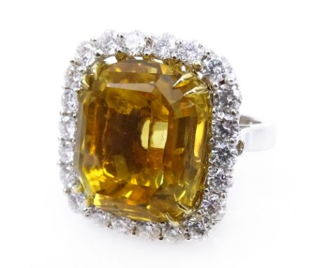 Approx. 23.0 Carat Cushion Cut Citrine, 2.20 Carat Round Brilliant Cut Diamond and 18 Karat White Gold Ring. Stamped 750. Ver