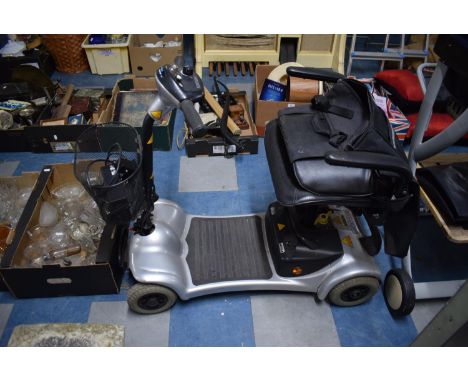 An Electric Mobility Scooter, Ultra Lite 480. With charger and working order. 