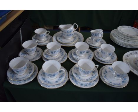 A Coulclough Floral Pattern Tea Set comprising Ten Trios, Cake Plate, Sugar and Cream, Two Saucers and a Cup 