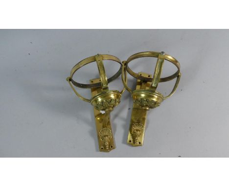 A Pair of Brass Wall Mounting Oil Lamp Holders, 17cm high 