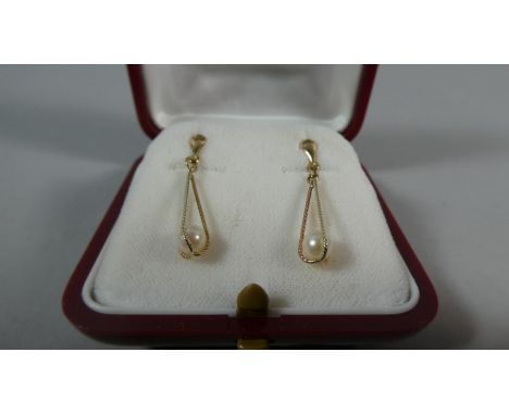 A Pair of 9ct Gold and Pearl Drop earrings