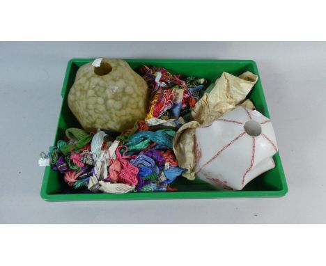 A Tray Containing Various Silks, Two Vintage Glass Lamp Shades etc 
