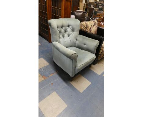 An Edwardian Button Upholstered Armchair 
