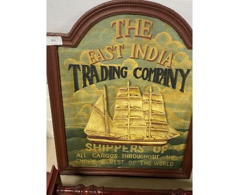 A vintage style wooden sign for The East India Trading Company 