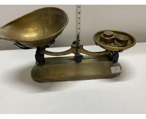 A pair of vintage weighing scales including weights. shipping unavailable. 