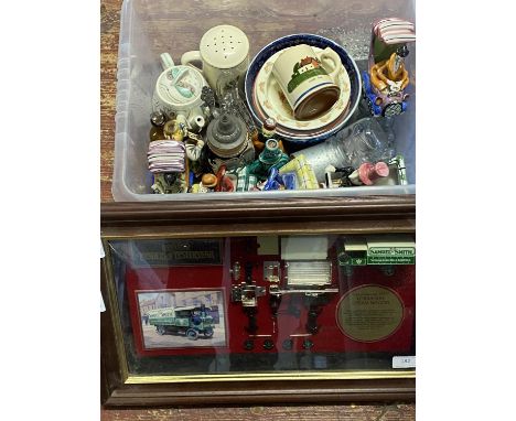 A box of assorted collectables including a cased matchbox model selection, shipping unavailable 