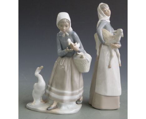 Two Lladro and two Nao figurines, tallest 27cm&nbsp;