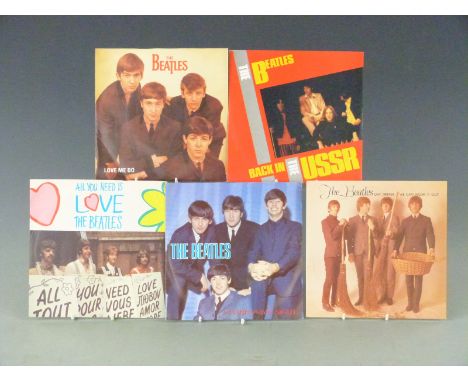 The Beatles - 23 singles, later issues including picture covers, two picture discs and solo records