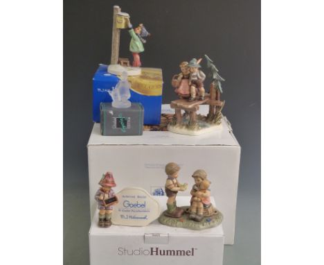 Five Goebel figures including advertising and larger figural groups, some boxed