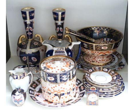 A quantity of Imari ceramics including a pair of twin handled vases, biscuit barrel, clock etc, tallest 28cm