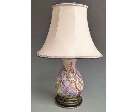 Moorcroft table lamp decorated with mauve flowers and foliage, with shade, H48cm