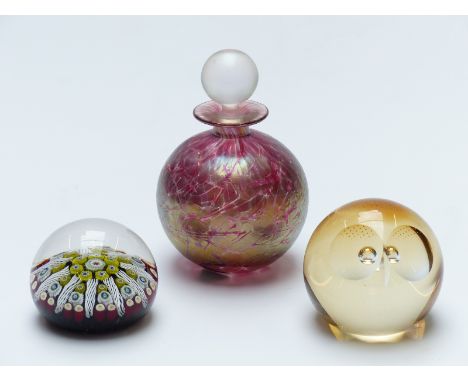 Isle of Wight glass perfume bottle and stopper, Caithness Wise Owl paperweight and a Perthshire/ Strathern example.&nbsp;