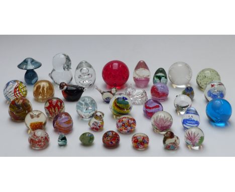 Thirty-five glass paperweights including Caithness, Alum Bay, etc.&nbsp;