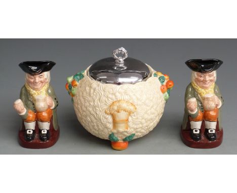 A Clarice Cliff Celtic Harvest biscuit pot with chromed lid together with two Royal Doulton Toby jugs, tallest 16.5cm&nbsp;