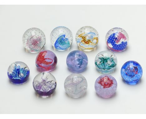 Twelve Caithness glass paperweights including miniature and Collectors' Club editions with certificate of authenticity&nbsp;