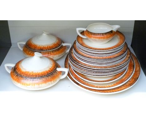 Clarice Cliff dinner ware decorated in the orange Aura pattern with Bizarre and Wilkinson pottery backstamps, six place setti