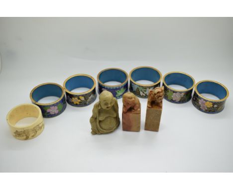 Six Chinese cloisonné napkin rings, soapstone sealwith Buddaha finial, engraved Japanese napkin ring, etc&nbsp;