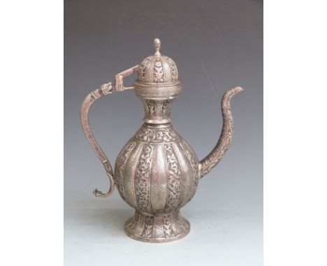 Persian/ Indian pedestal coffee pot with deep relief decoration of flowers, elephant trunk spout, snake handle and hinged lid