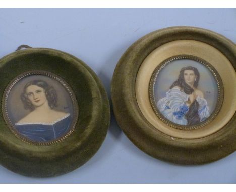 Two oval portrait miniatures of ladies, both indistinctly signed, maximum diameter 8cm, in green velvet frames