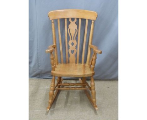 A beech Windsor rocking chair, H112cm&nbsp;