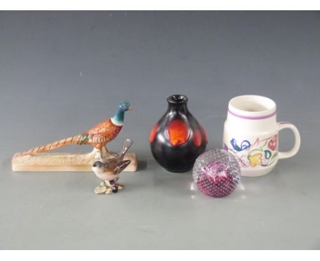 Beswick pheasant model 1774, Poole pottery vase and mug and Caithness paperweight