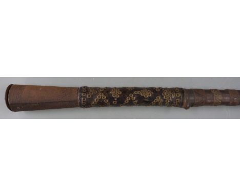 19thC African tribal chief's or headman's staff with braided wire, riveted leather, brass spiral serpent decoration and an en