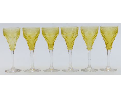 Six John Walsh Walsh wine glasses with uranium style yellow glass bowls cut and engraved with fruiting vines, raised on clear