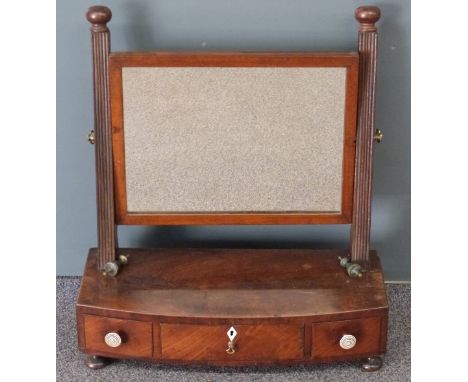 19th century mahogany bow front mirror with three drawers below, width 51cm