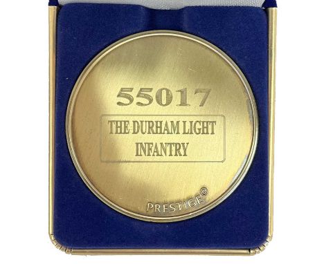 A commemorative gold award medallion to 55017 The Durham Light Infantry