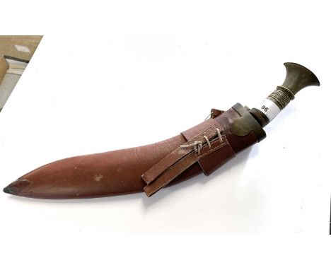 Kukri knife with horn handle and metal pommel, double fuller to blade together with leather scabbard and one skinning tool, o