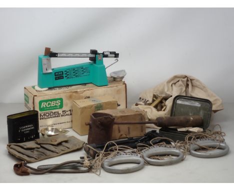 An RCBS Reloading Scale, assorted Bullet Cases, Bipod, Pull Throughs, etc. 