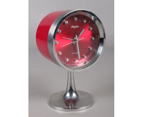 A retro Rhythm drum shaped alarm clock. With chrome support.  