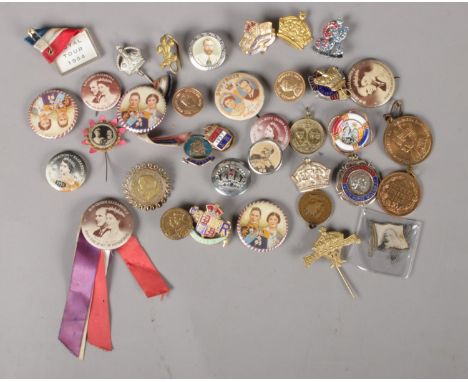 A collection of royalty badges. Includes enamel examples.  