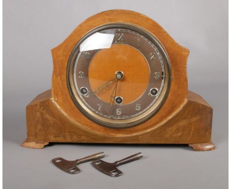 A Bentima wooden mantle clock. Comprising of a Perivale movement stamped inside. To include spring driven mantle clock with a