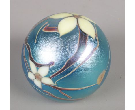 A vintage Okra glass paperweight with floral decoration. Marked to base and dated 1984.  Marks to decoration.