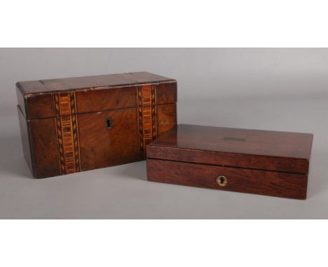 A Victorian mahogany tea caddy. To include a mahogany boxed geometry set.  broken hinges to tea caddy lid.