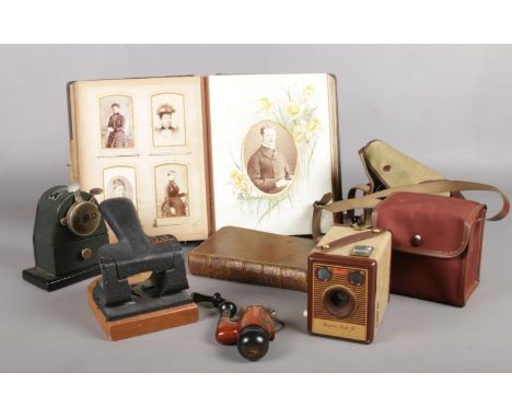 A collection of miscellaneous. Vintage photograph album, The Bullfinch hole punch, Kodak Brownie Flash IV with case etc  