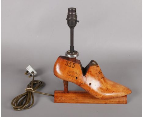 A novelty Mobbs &amp; Lewis Ltd shoe stretcher table lamp.  