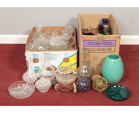 Two large boxes of assorted glassware. To include cut glass decanter, coloured trinket dish and glass floats.  