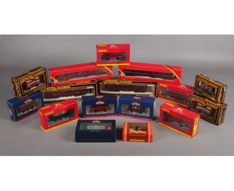 Sixteen boxed 00 gauge scale models from various makers. To include Hornby, Bachmann and Mainline Railways. Mostly rolling st