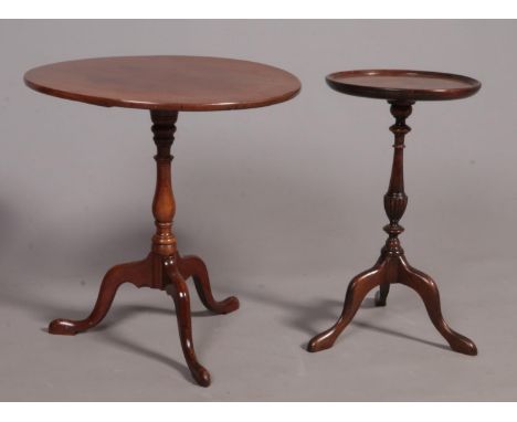 Two mahogany tripod wine tables. The smaller example having a dish top.  