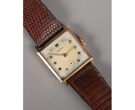 A gents 9ct gold Vertex manual wristwatch.  Seconds finger missing. Lacking glass. Does appear to run.