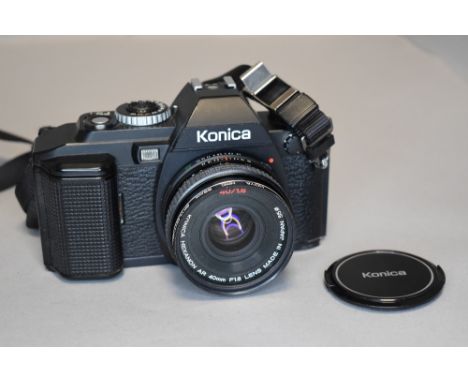 A Konica FS-1 camera with 40mm lens  no case