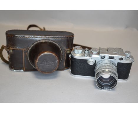 A Leica IIIf camera (656136) with Summarit 50mm lens (1055492) screw mount in original case