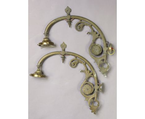 A pair of Edwardian brass wall-mounted gas light wall brackets, 41cm long. 