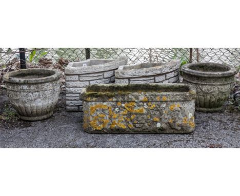A pair of Stanford stone crescent-shaped garden urns, 60cm wide x 32 high, a pair of reconstituted-stone garden urns, and a s