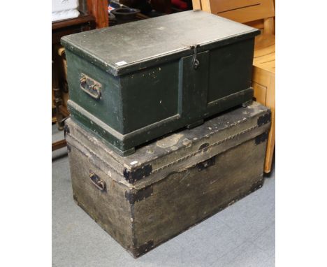 A black painted deal tool chest with a hinged lift-lid &amp; with wrought-iron side handles, 66cm wide; a fibre-covered stora