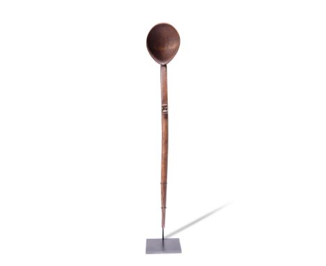 A Nguni spoon / ladle South Africa the handle carved in relief a pair of breasts, a line of amasumpa and two horizontal lines